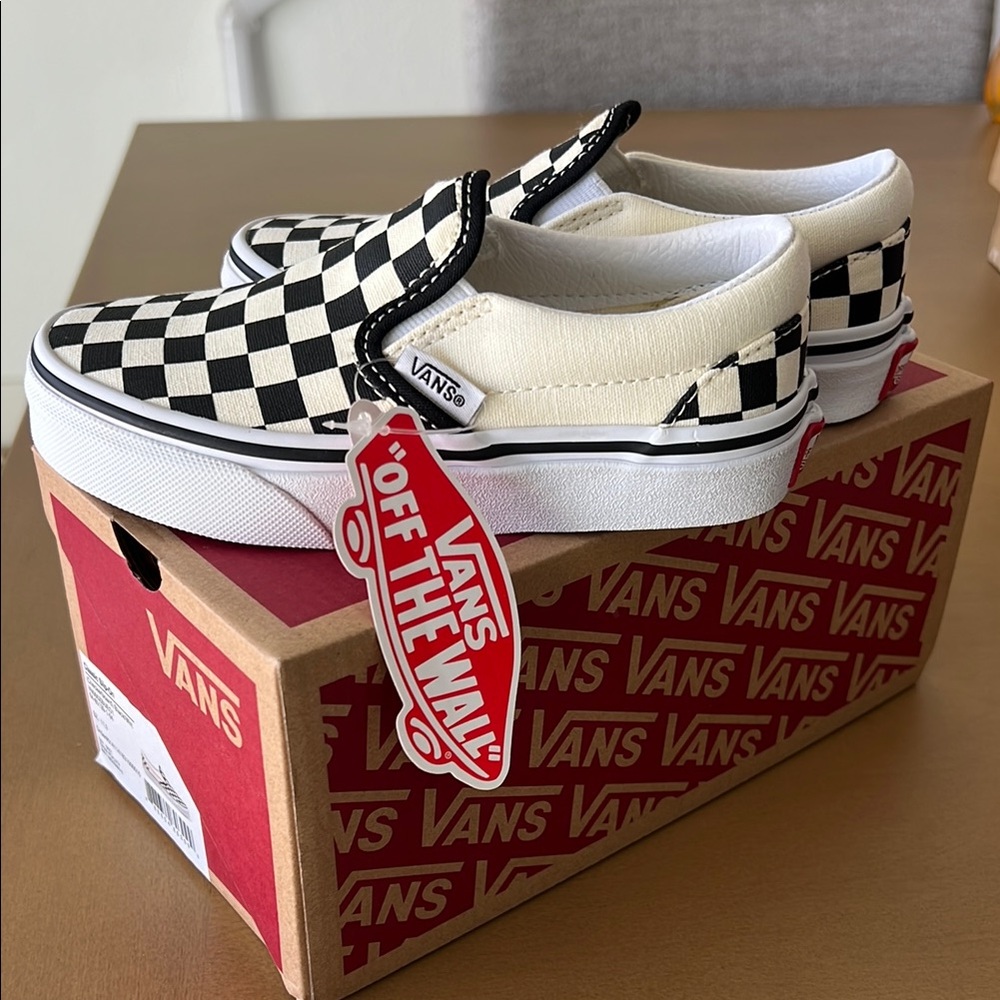 Vans Black and White Checkerboard Slip-Ons